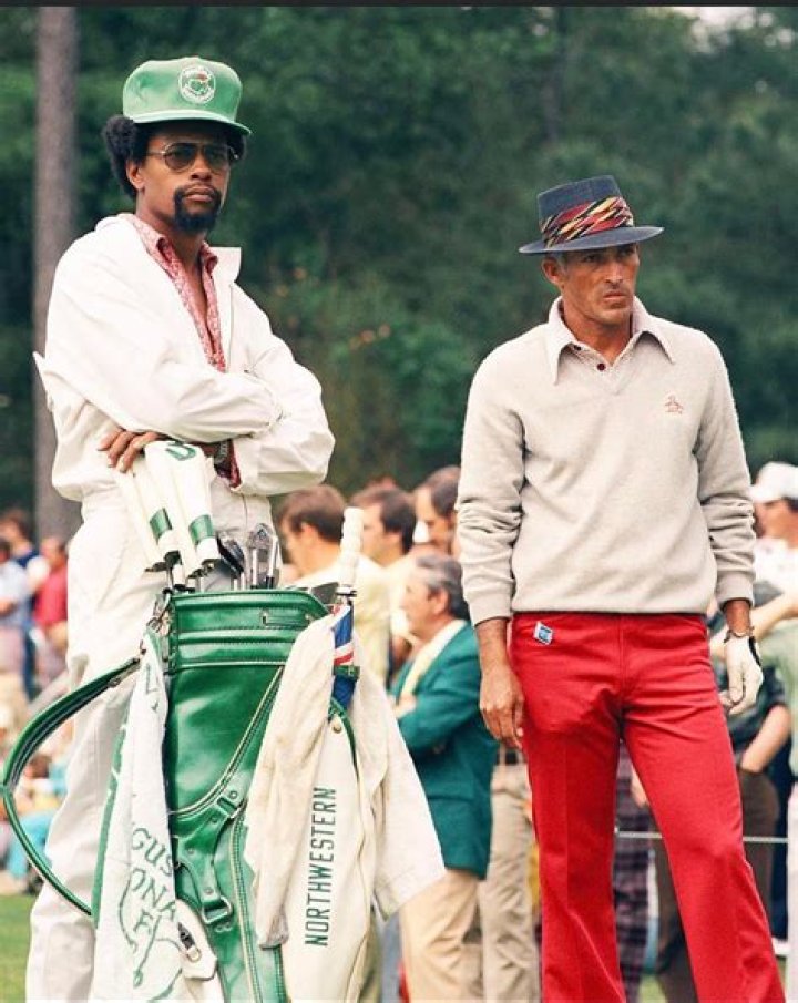 How much does Dustin Johnson pay his caddy?